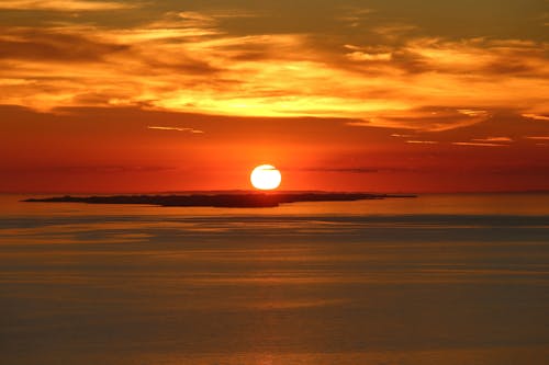 Fotos de stock gratuitas de agua, cielo naranja, escénico