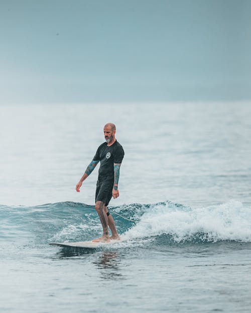 Foto d'estoc gratuïta de Canon, fent surf, fer surf