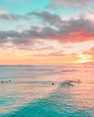 People Riding on Boat on Sea during Sunset