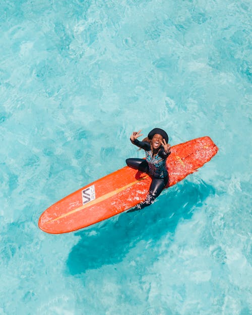 Portrait of a Woman on a Surfboard