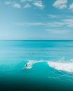 Person Surfing on Sea Waves