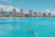 City along Shore of in Blue Sea 