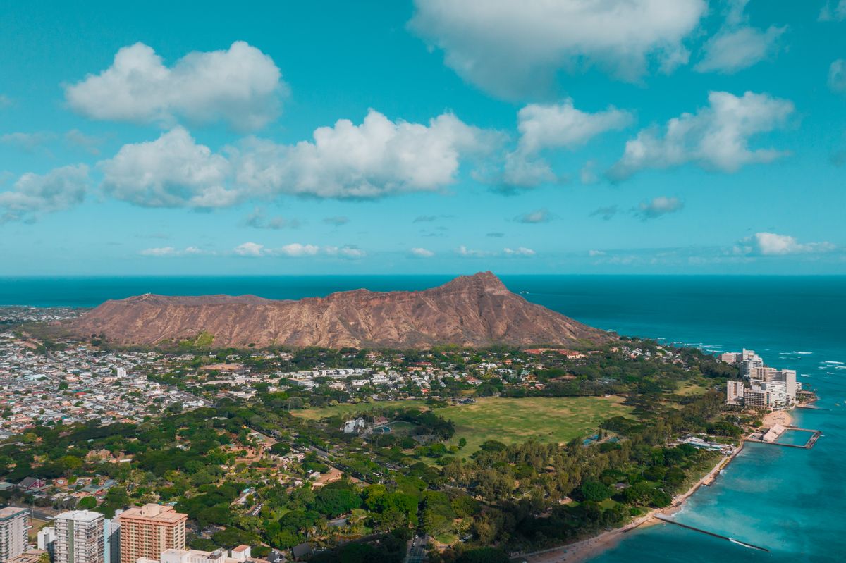 Aerial view of Diamond Head crater above Honolulu's South Shore, Oahu
