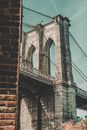 Brown Brick Wall With Gray Concrete Bridge