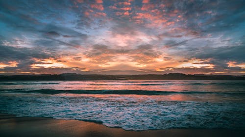 Бесплатное стоковое фото с волны, восход, живописное небо