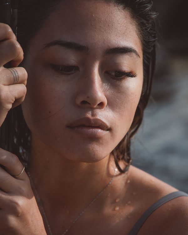 Close-up of a woman's face highlighting well-defined natural brow shape