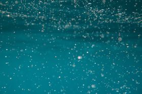 Turquoise shallow water, photo by Jess Loiterton on Pexels