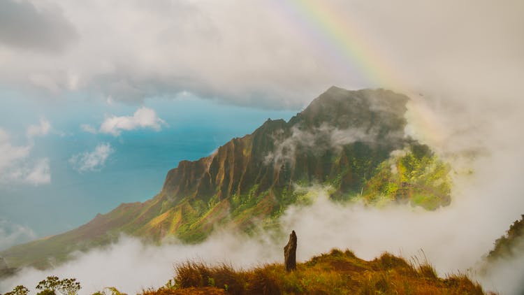 Rainbow Over Idyllic Mountain