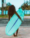 Woman in Black Shirt Holding Blue Surfboard