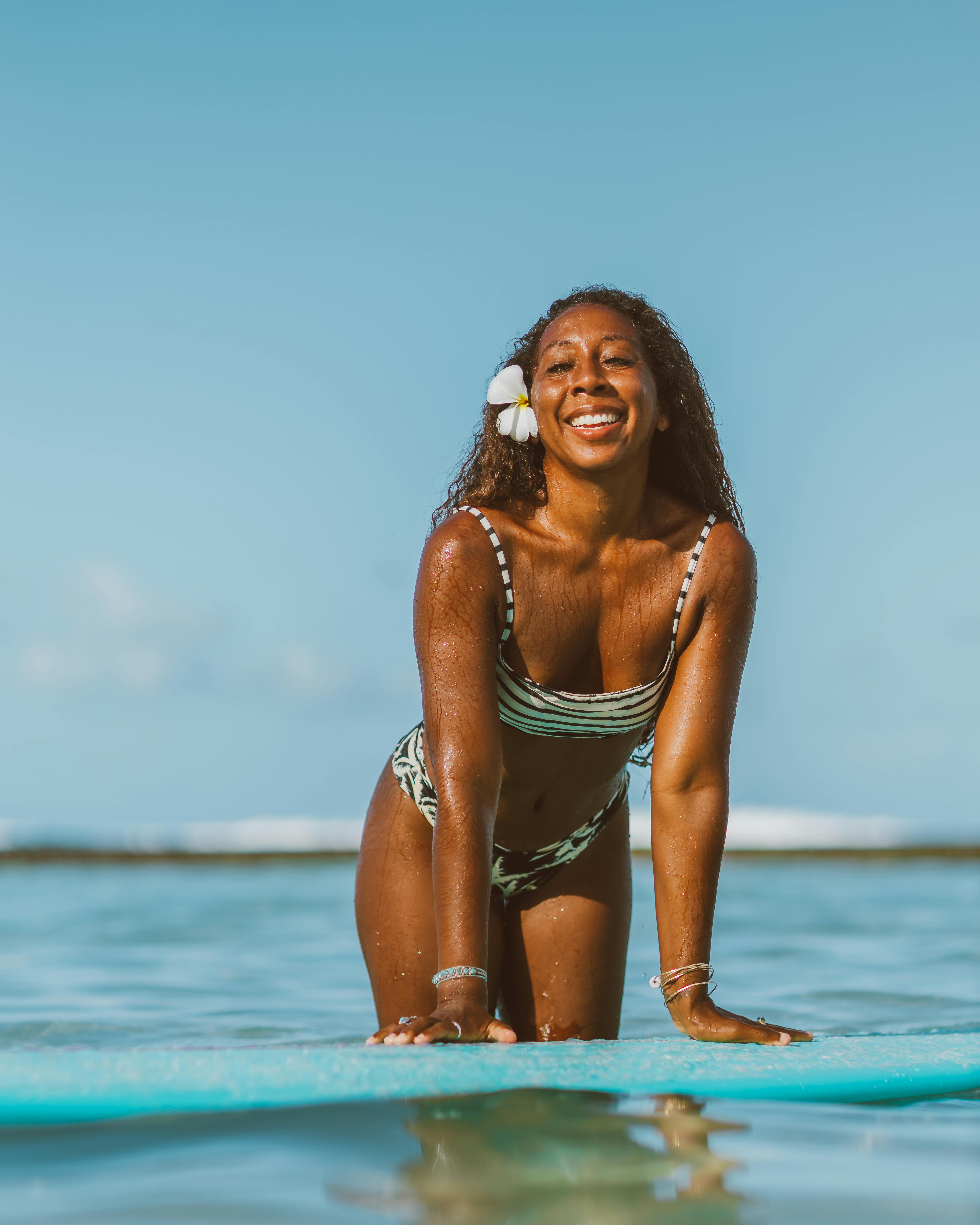 Portrait of beautiful African American woman in bikini enjoying