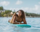 Woman in Blue Swimming Pool