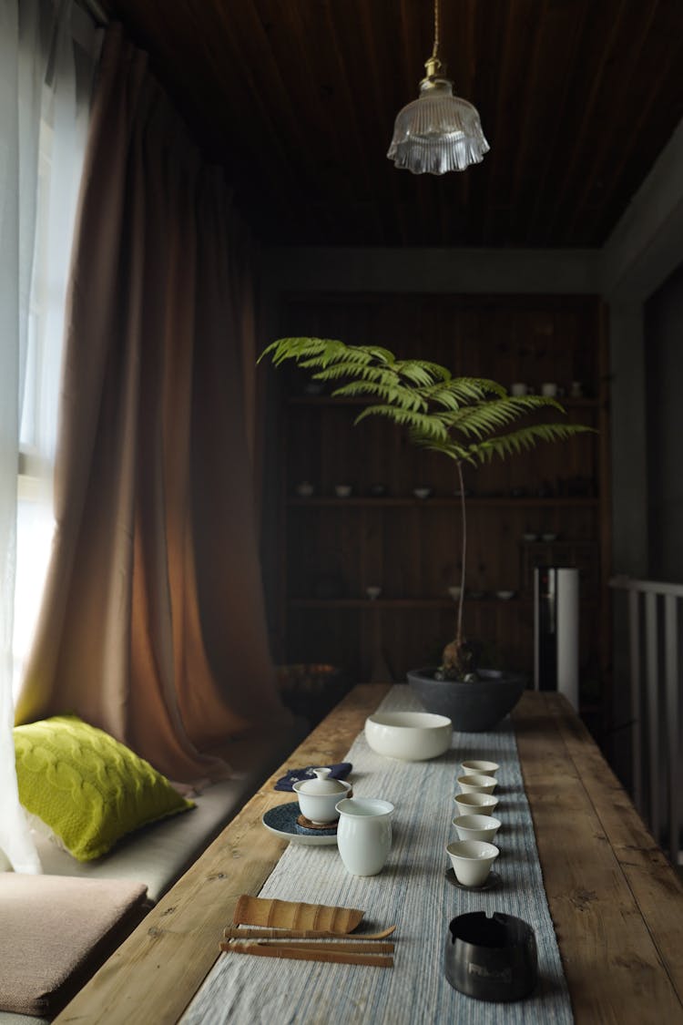 Long Table With Cups On It