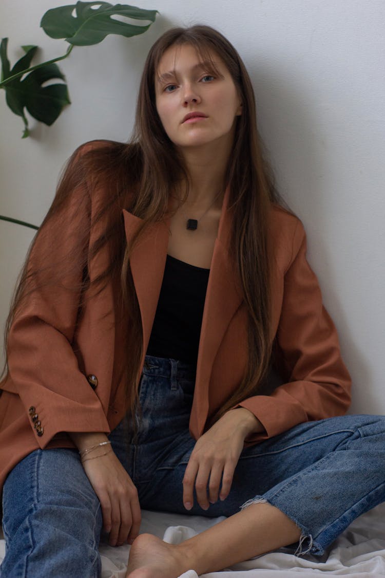 Stylish Young Woman Resting On Bed