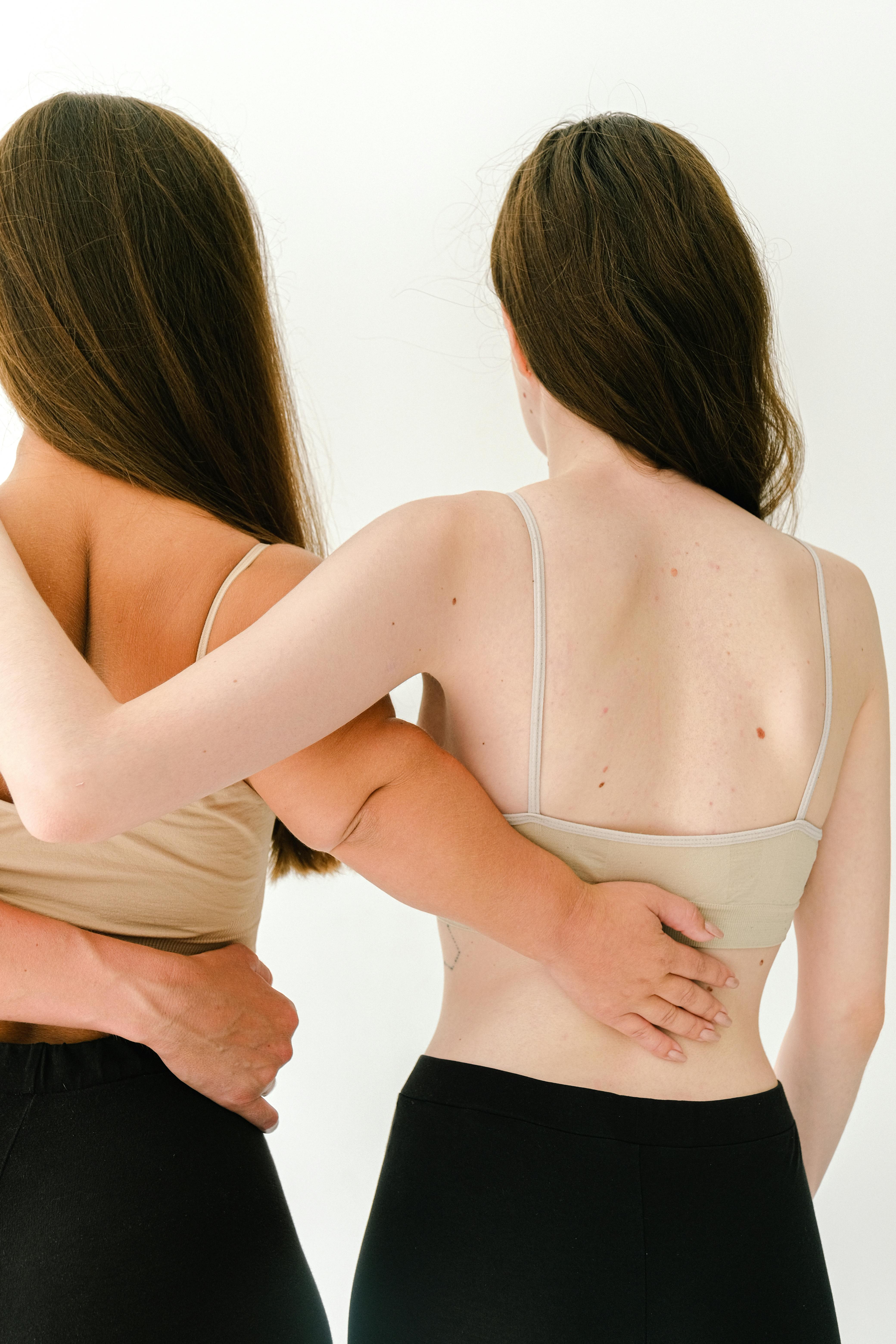 Friends-Smiling-And-Hugging