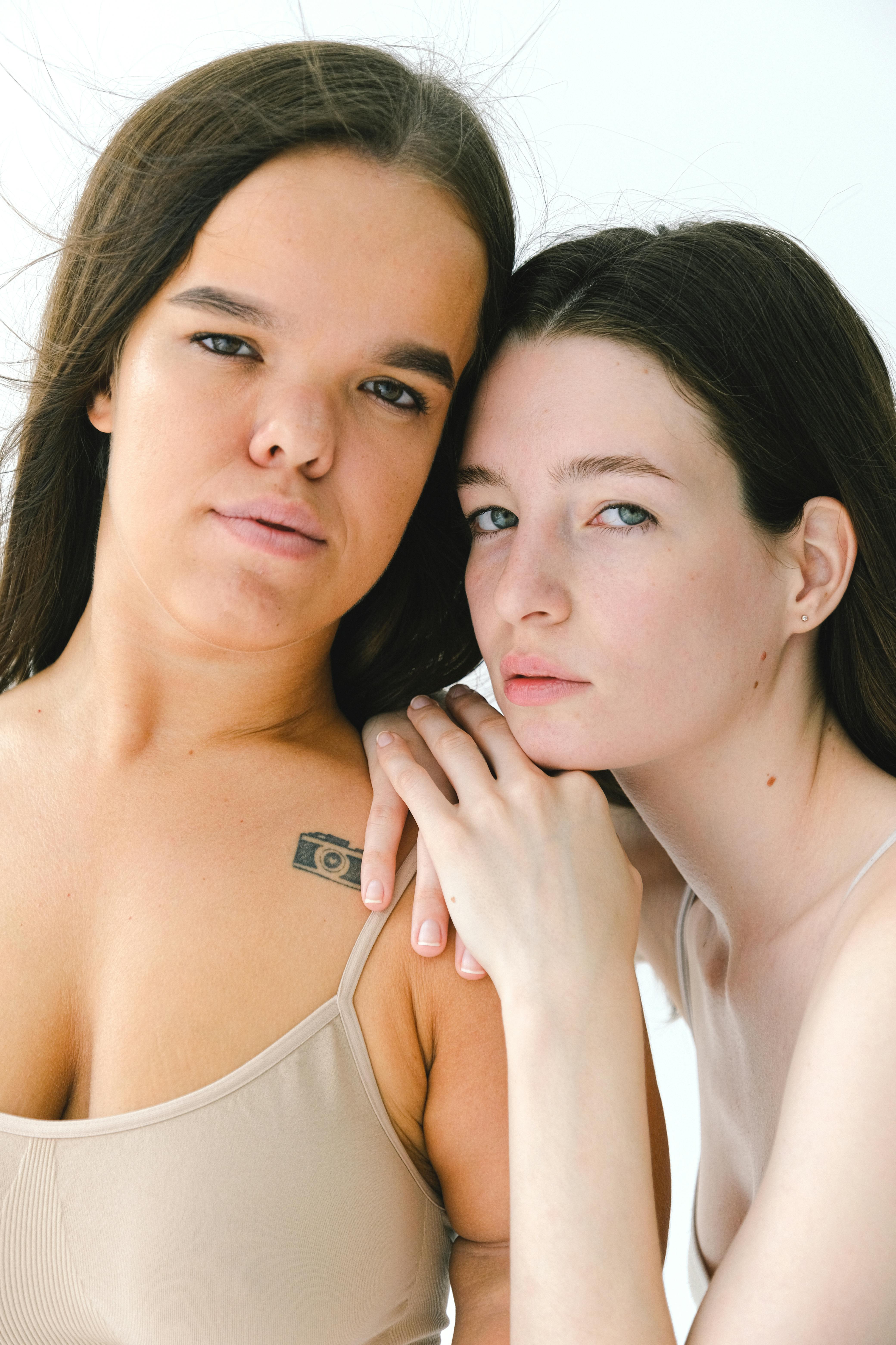 close up photo of two women