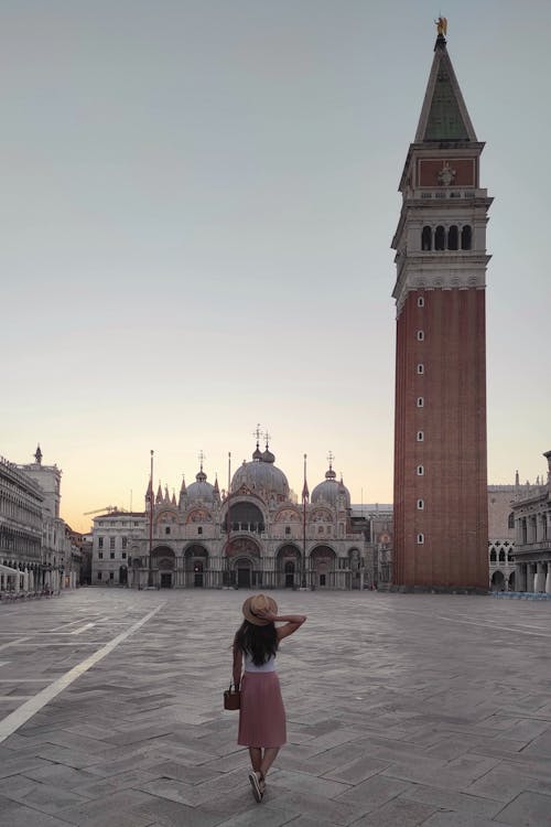 Woman Standing at St. Mark's Square · Free Stock Photo