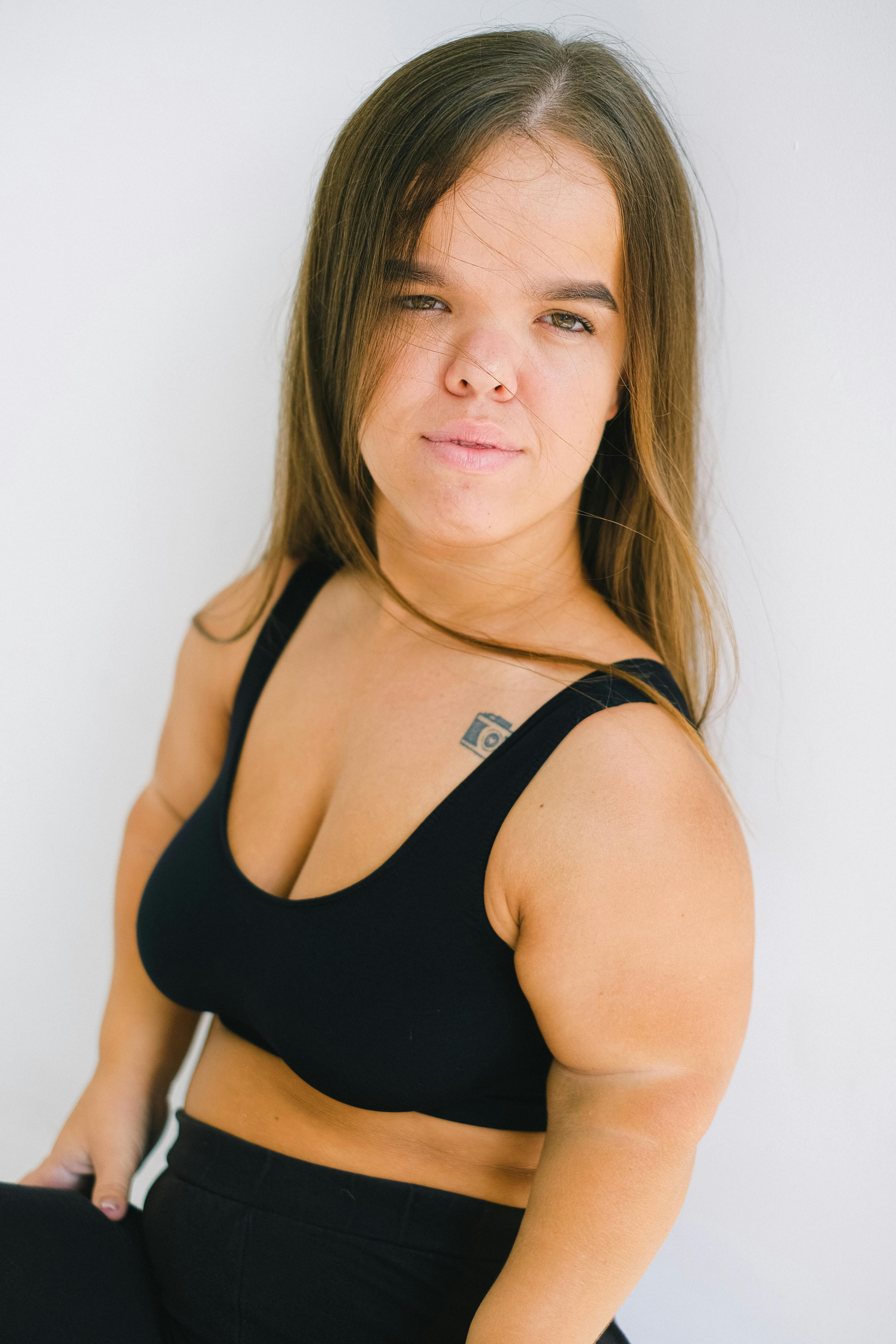 woman in black bra stock photos - OFFSET