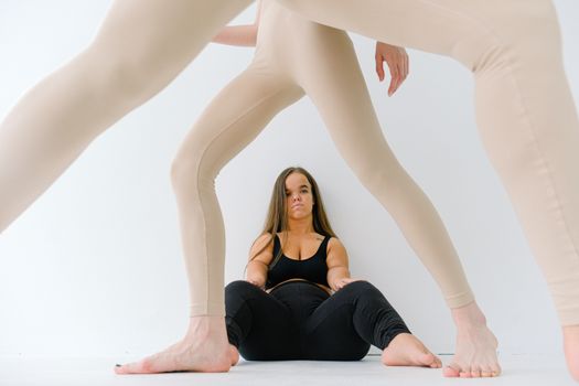 A Woman in Black Top and Leotards