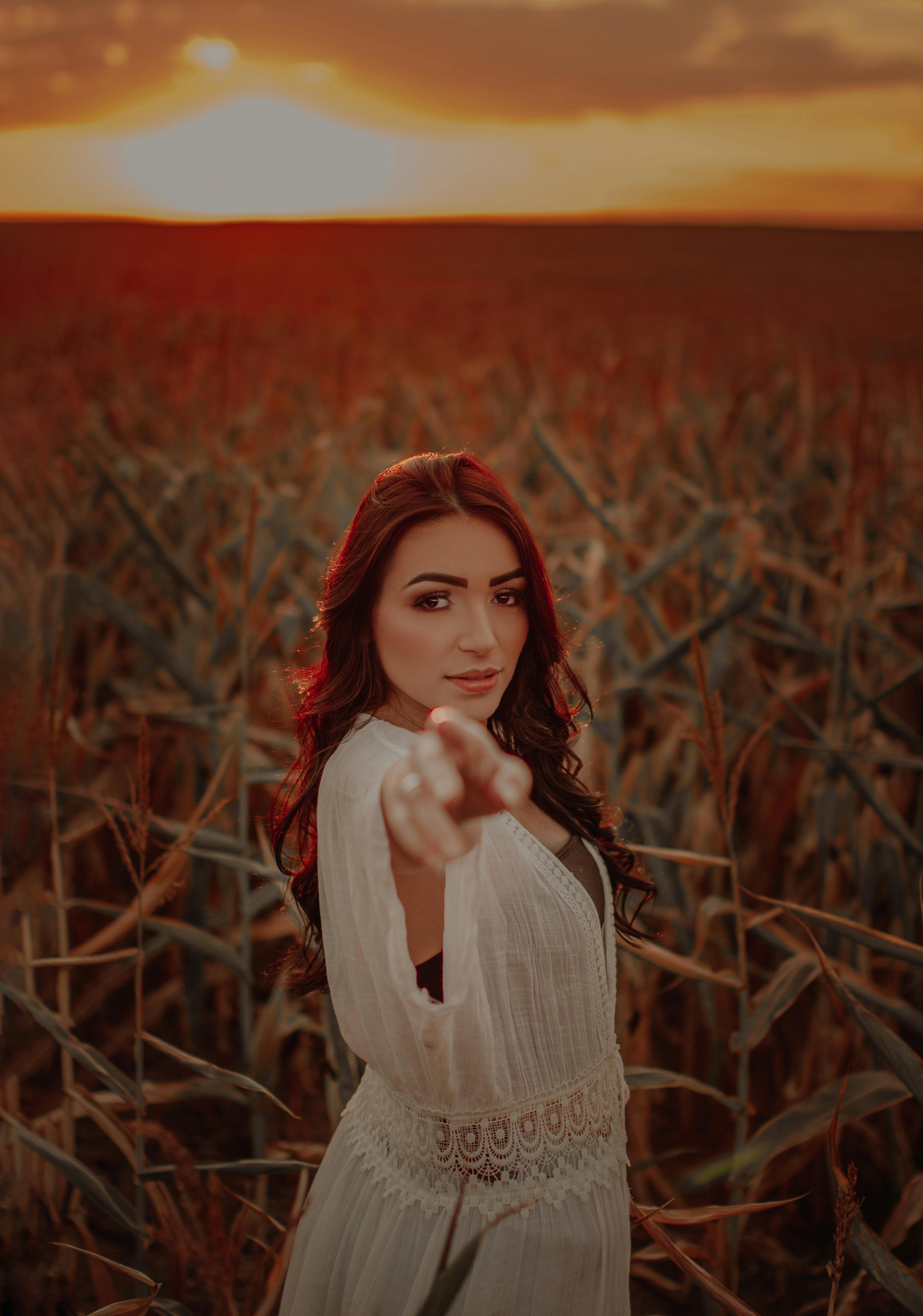 a beautiful woman pointing with her finger