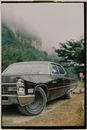 Photo of a Parked Black Cadillac
