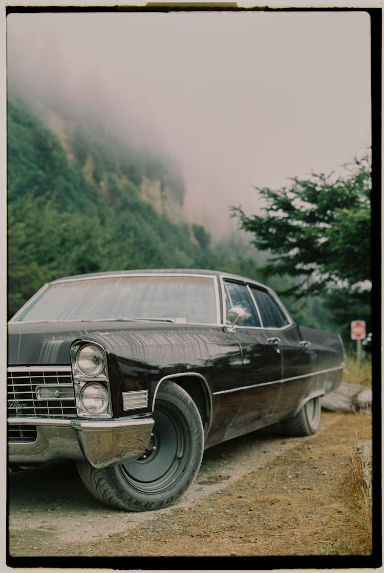 Photo Of A Parked Black Cadillac 