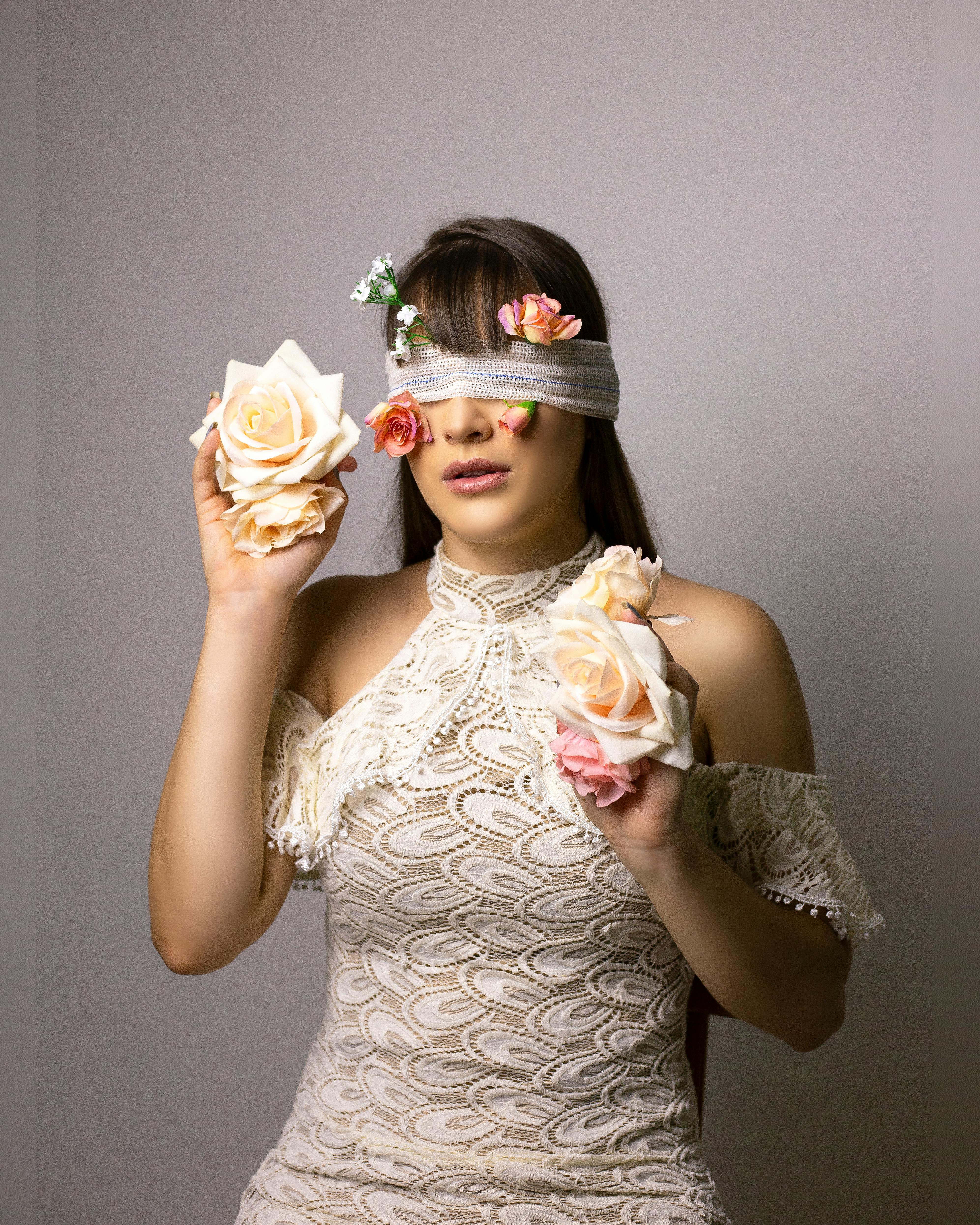 blindfolded woman on white background