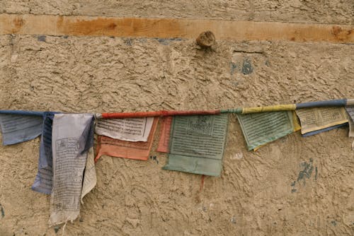 Prayer Flags on Concrete Wall