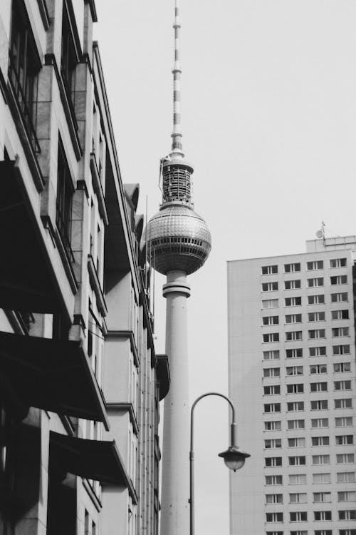 Grayscale Photo of Berliner Fernsehturm Tower in Berlin, Germany

