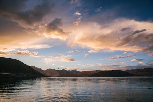 Cloudscape with Mountains and Lake