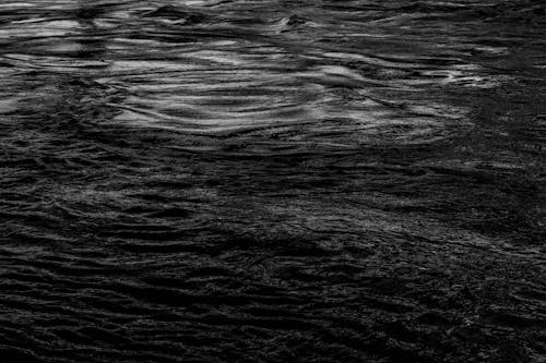 Free Black and White Close-up Picture of Waves on a Lake Stock Photo