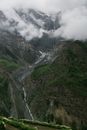 Green and Gray Mountains Under White Clouds