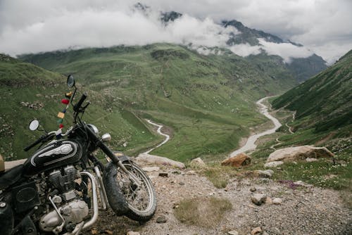 Parked Motorcycle and Green Mountains