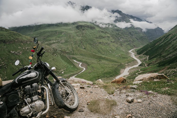 Parked Motorcycle And Green Mountains