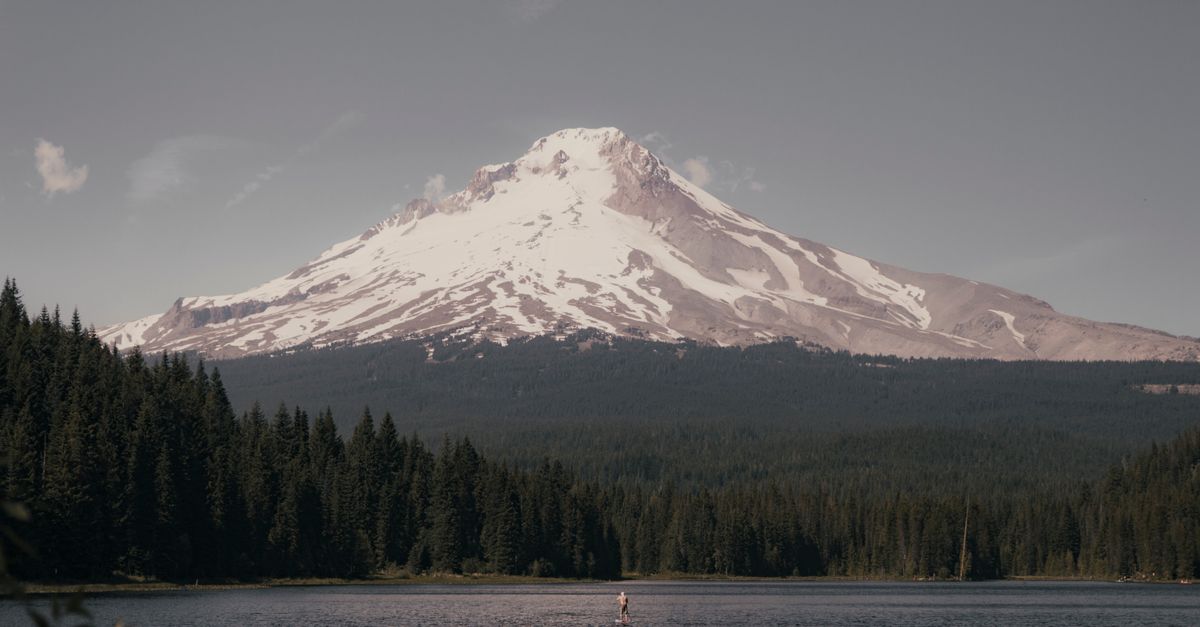 Stunning view of Mount Hood reflecting in Trillium Lake in Oregon, perfect for outdoor adventures.