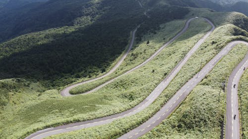 Бесплатное стоковое фото с асфальт, Аэрофотосъемка, байкеры