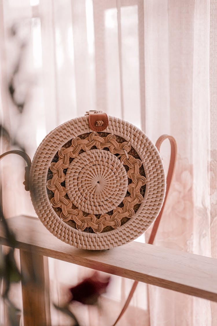 Close-up Photo Of A Round Rattan Bag