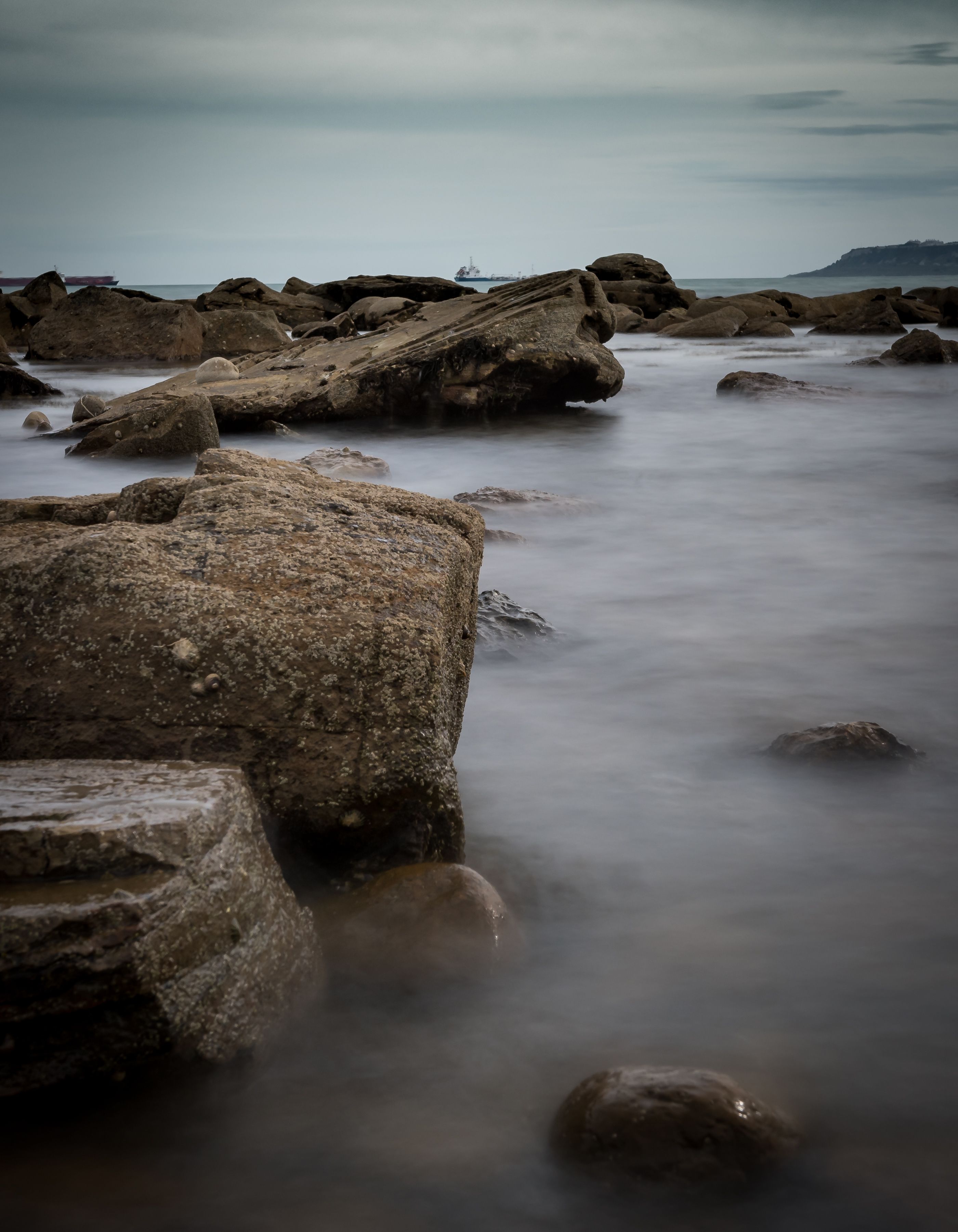 Rocky Shore under a Cloudy Sky · Free Stock Photo