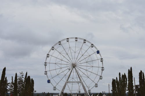 White Ferris Wheel Under Blue Sky