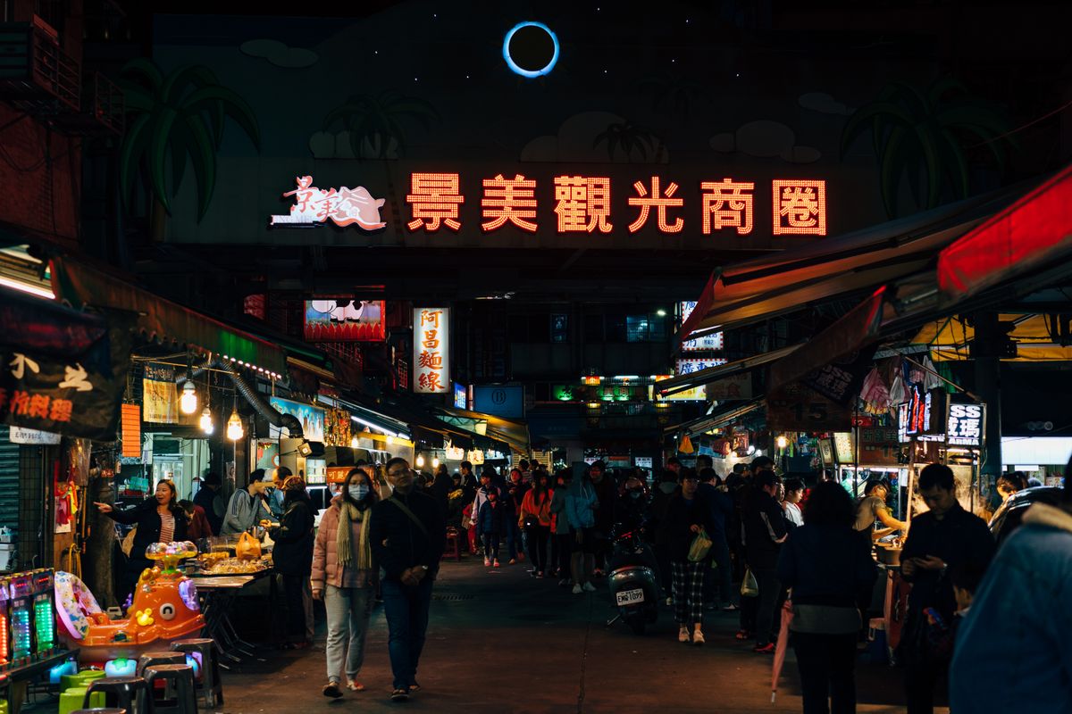 Taiwan night market food stalls with crowds