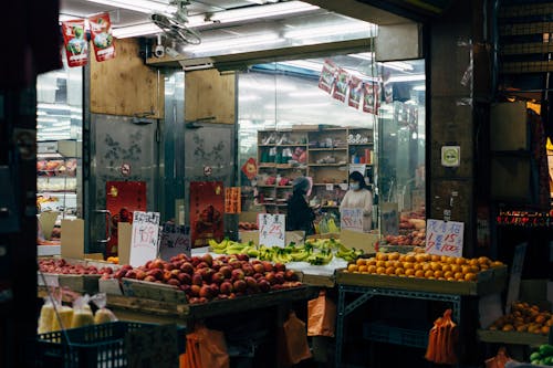 Free Variety of Fresh Fruits Displayed outside a Shop Stock Photo