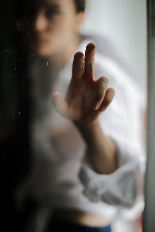 Person in White Long Sleeve Shirt