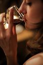 Woman Holding Clear Wine Glass