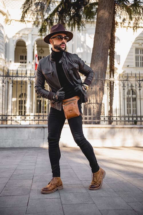 Free A Fashionable Man Posing on Sidewalk Stock Photo