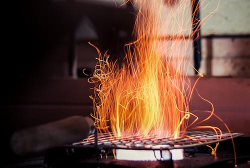 Sparks Flying off of a Grill
