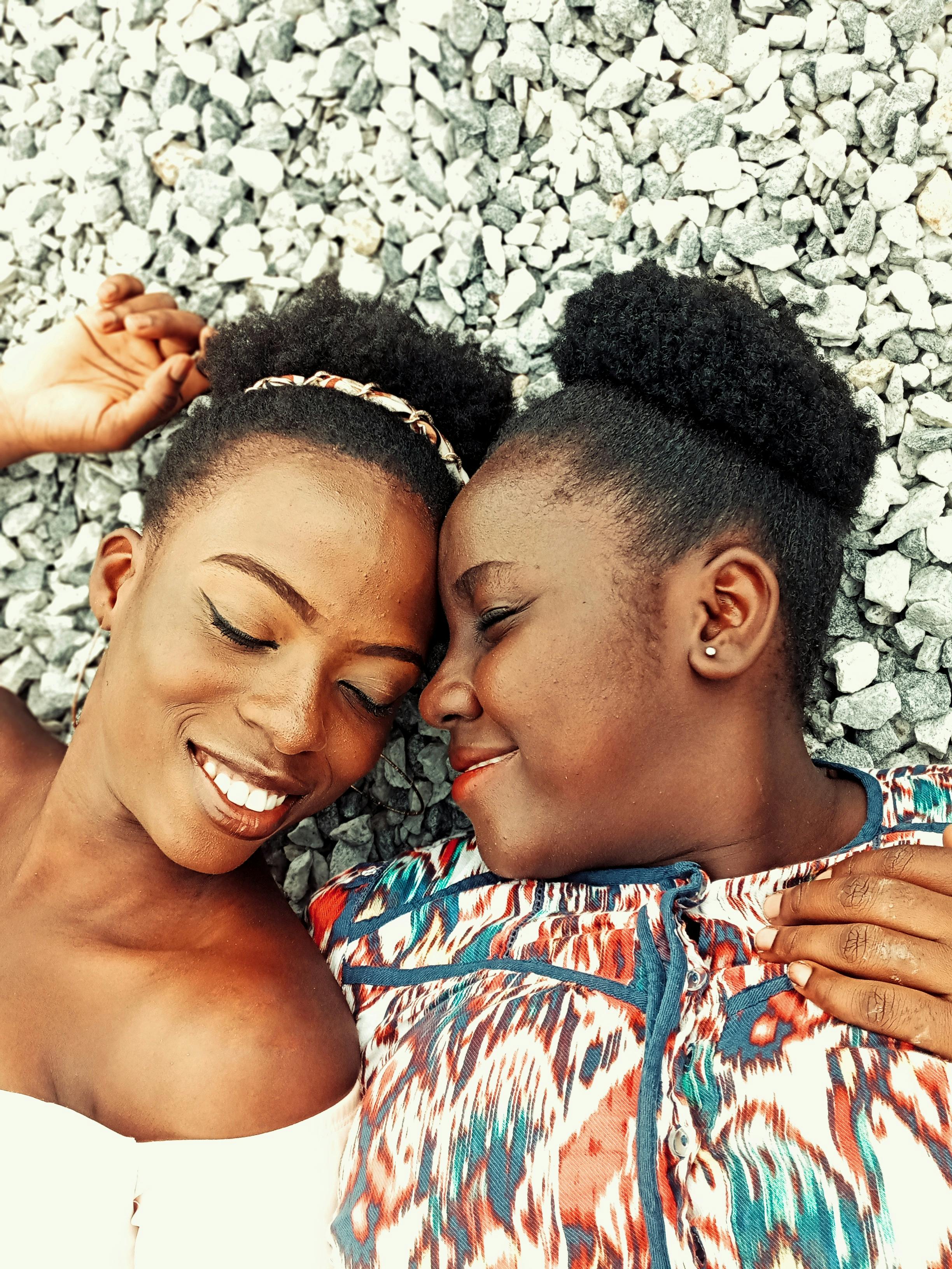 happy black women on pebble