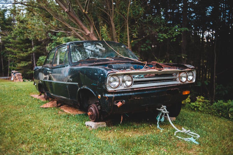 Old Car Placed On Grass