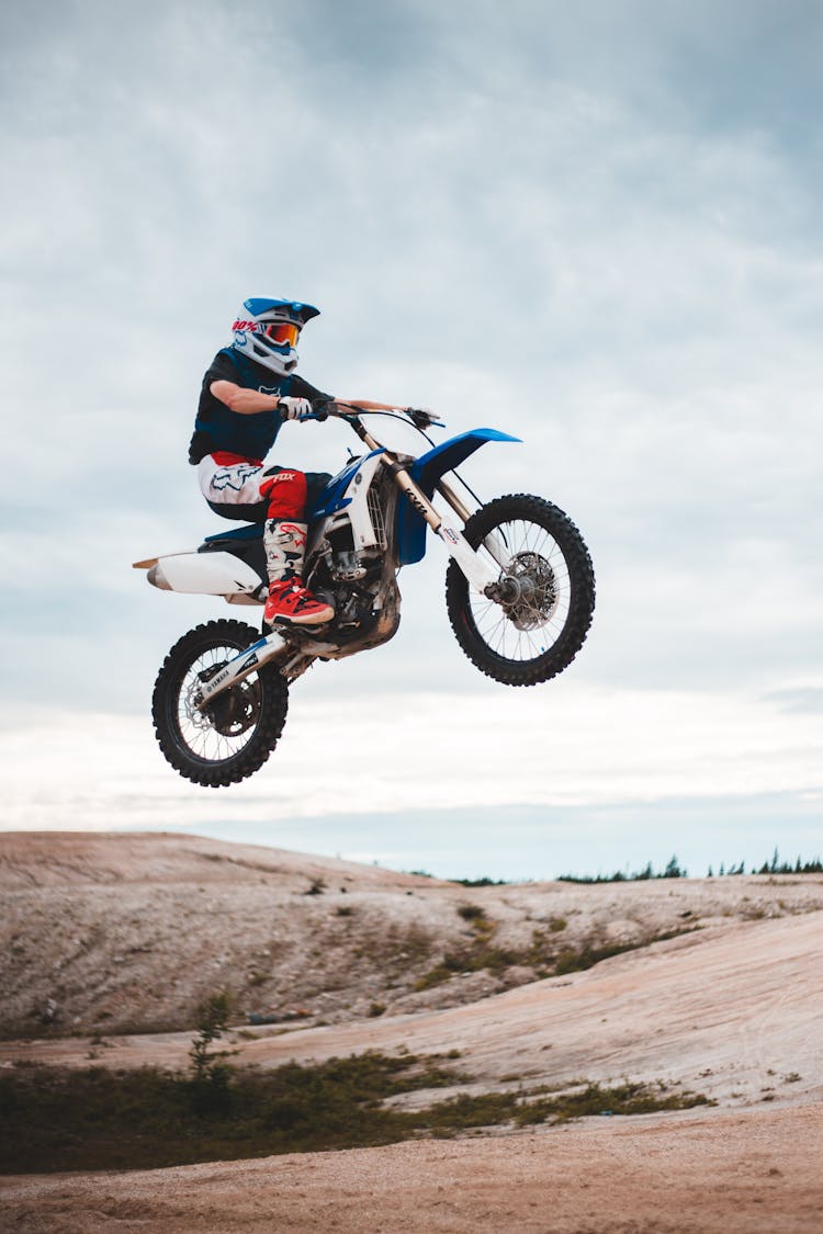 Unrecognizable Biker Doing Motorcycle Trick