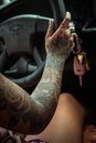 Crop informal woman driving car