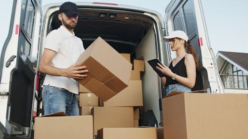 Free Man and Woman Working Together Stock Photo