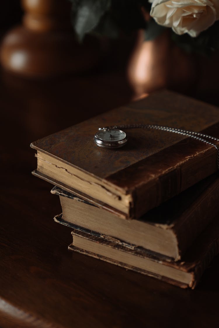 Silver Ring On Brown Wooden Box